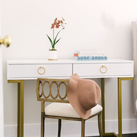 Catch up on emails at the cute writing desk