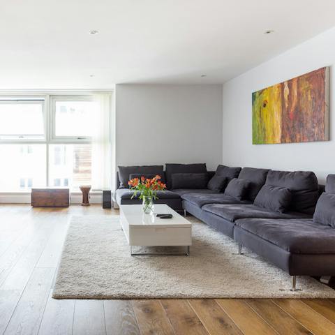 Stretch out in the large and spacious living area, after a long day of exploring London