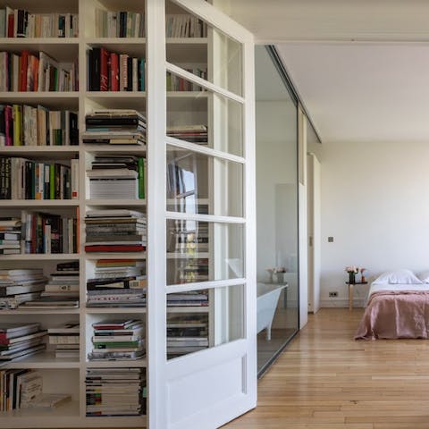 The floor to ceiling bookshelves