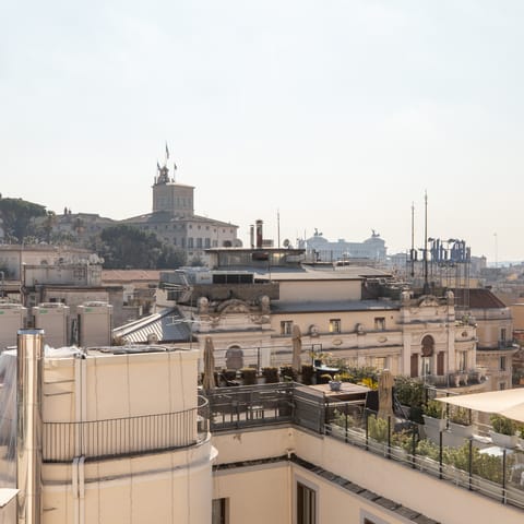 Admire the view of the Vittoriano from the balcony