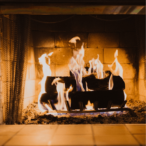 Spend evenings snuggled up next to the fireplace