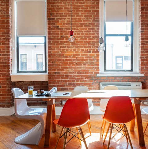 Eat meals together in front of the exposed brickwork walls