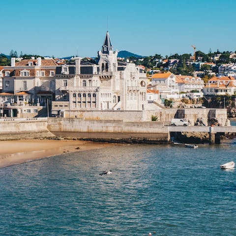 Grab your sun hat and take the three-minute stroll down to the sandy shores of Praia da Ribeira de Cascais