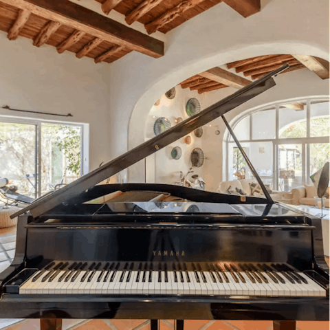 Play a tune on the grand piano