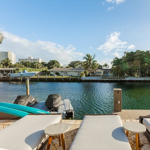 Balance lazing on the loungers with paddleboarding on Stranahan river