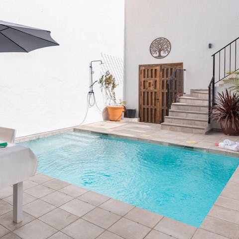Take a dip in the private pool, followed by a refreshing outdoor shower