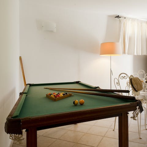Get competitive over a game of pool in the lounge