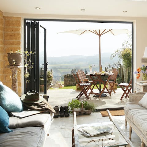 Admire the views across the rolling hills from the terrace