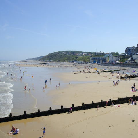 Pack you r bag and spend the day at Cromer Beach, eight minutes' walk away