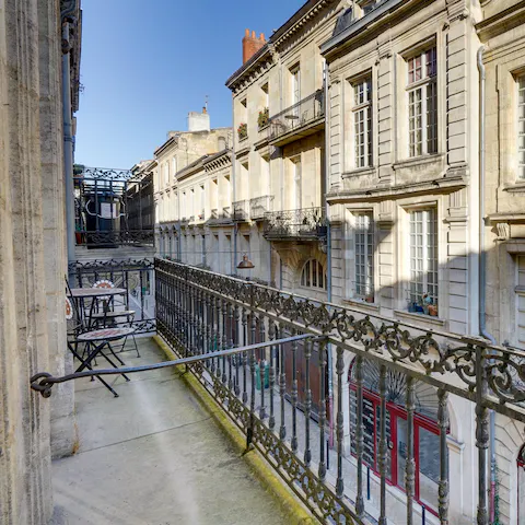 Enjoy your morning coffee and croissants on the private balcony