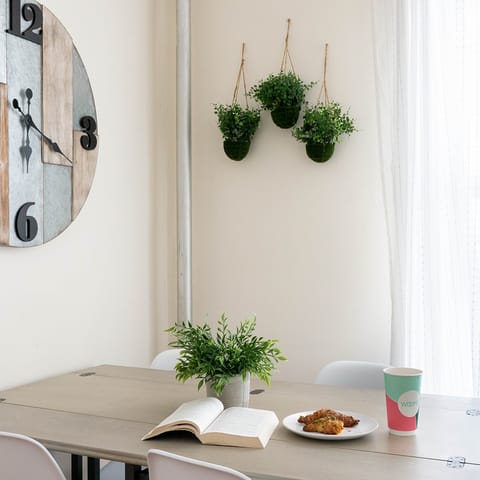 A trio of hanging planters 