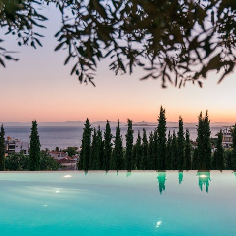 Go for a swim at sunset and take in the views over the Athenian Riviera