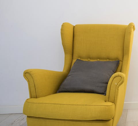 The mustard-yellow chairs