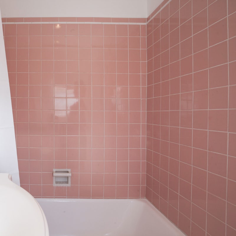the pink tiles in the bathroom