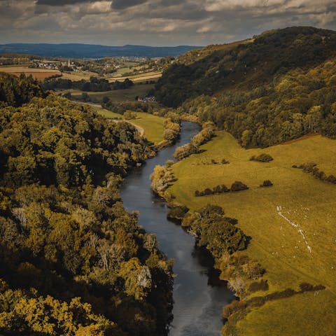 Enjoy a gentle canoe down the River Wye with views stretching out around you