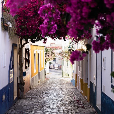 Experience the prettiest village in the Algarve, with Ferragudo's hillside streets, flowers and cottages