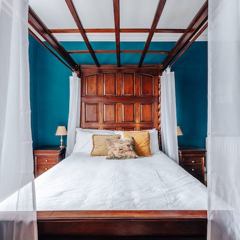 Choose a bedroom with a beautifully-crafted four poster bed