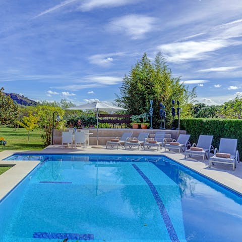 Make a splash in the villa's swimming pool and dry off on one of the loungers