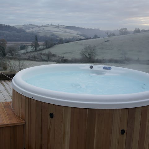 Sit back in the warmth of one of the hot tubs and savour the view of the south Devon countryside