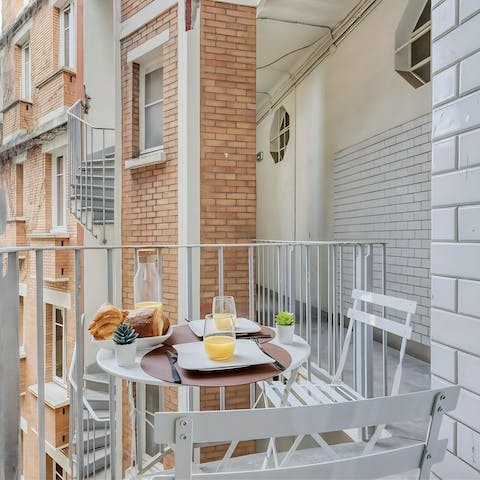 Start mornings slow and steady with a French breakfast on the balcony