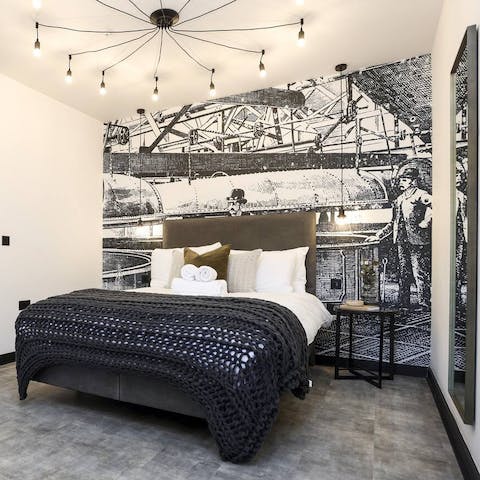 Slumber peacefully under the industrial lighting and creative feature wall