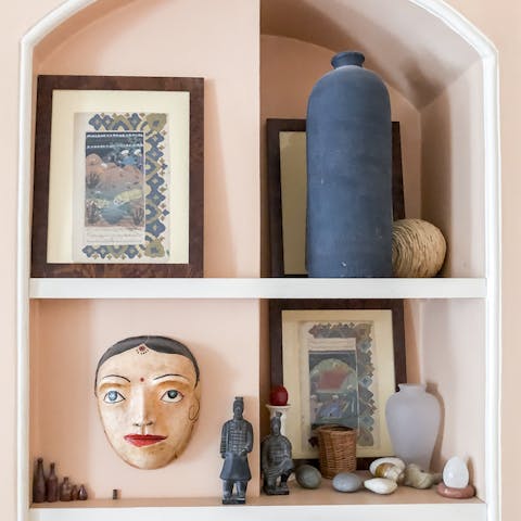 Admire the impressive collection of art and ceramics dotted throughout