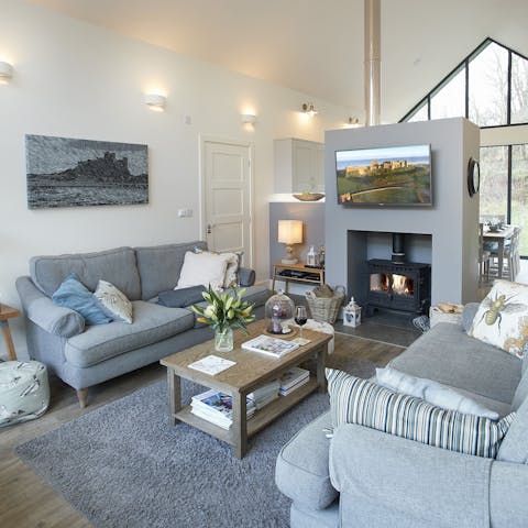 Cosy up by the living room's wood burner on cooler evenings