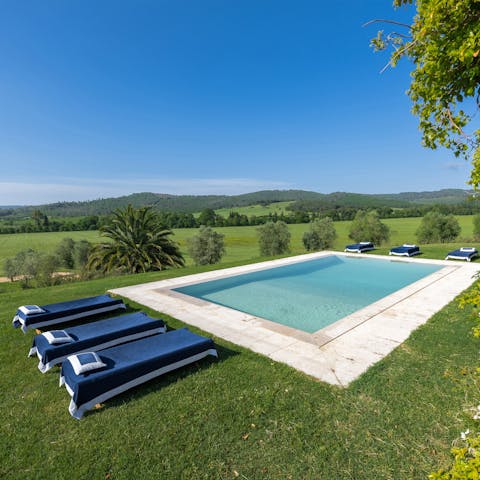 Swim in the private pool as nature sweeps around you