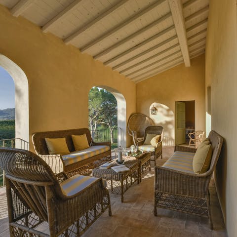 Gather on the covered terrace for evening aperitifs