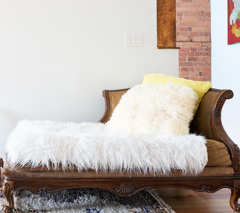Unwind in the vintage chaise lounge with modern touches