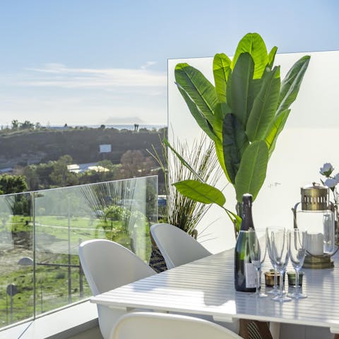 Enjoy a meal alfresco with views to the coast and beyond