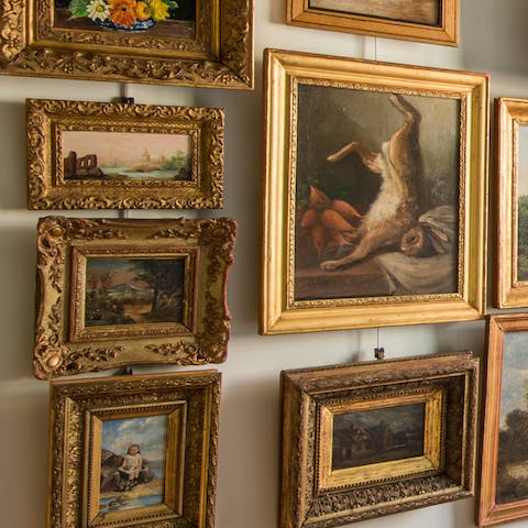 Admire the carefully curated art on display – your host restores classical paintings