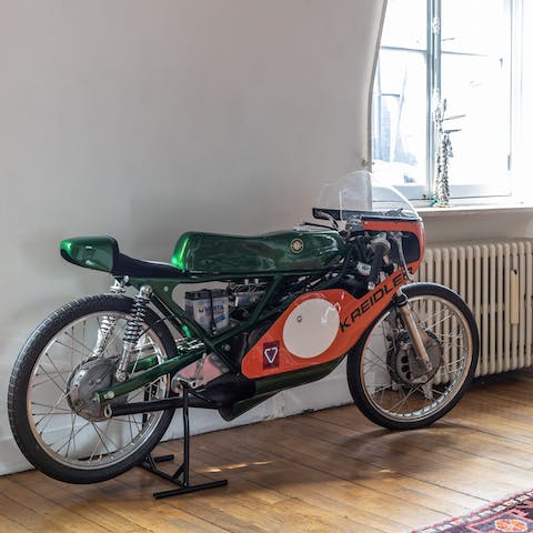 Admire quirky trinkets and collector's items like this vintage Kreidler bike