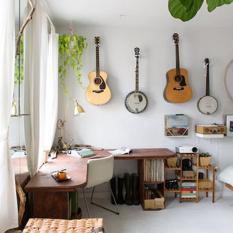 Enjoy the string instrument collection hanging like artwork 