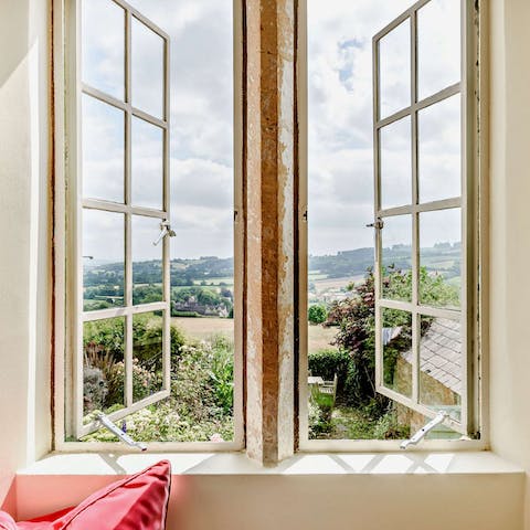 Wake up to panoramic views of the surrounding Blockley Valley