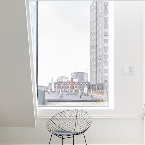 Find a sunny reading spot by the striking metre-long windows 