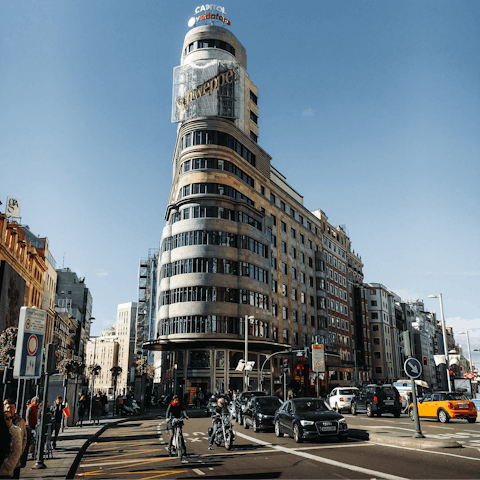 Admire the architecture along bustling Gran Vía