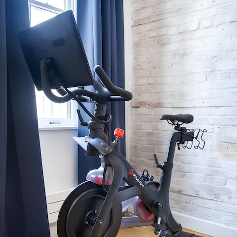 Start mornings with a quick spin on the peloton bike provided
