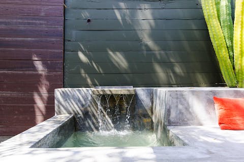 Find your moment of zen in the garden, with the gentle sound of the water feature