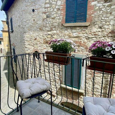 Sip your morning coffee on one of the quaint private balconies