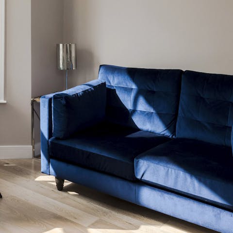 This blue velvet sofa