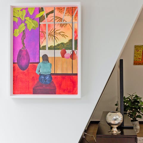 Get in touch with your inner art critic – this home has its own private gallery area