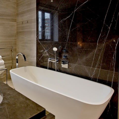 Enjoy a relaxing soak in the bathtub