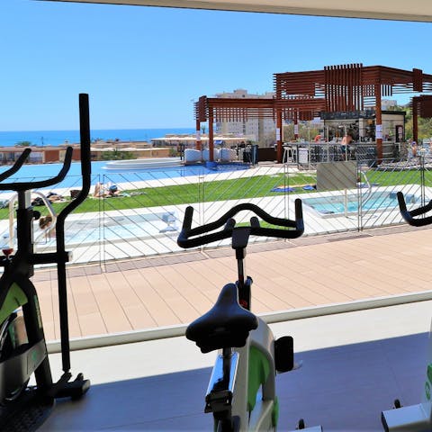 Stay on top of your fitness goals with a workout in the communal gym