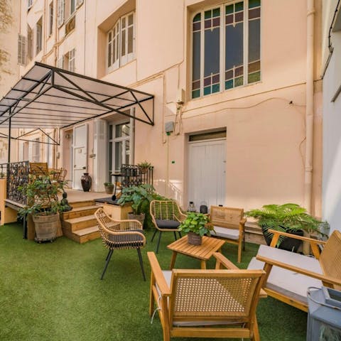 Relax in the private garden with a glass of Champagne