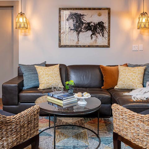 Unwind in the living area after a day of exploring Downtown Asheville – a four-minute drive away 