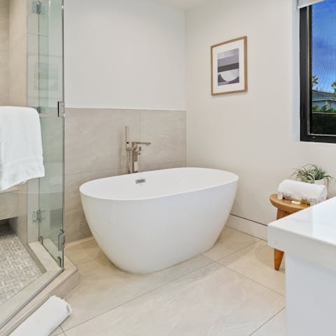 Sink back and relax into the elegant freestanding bathtub