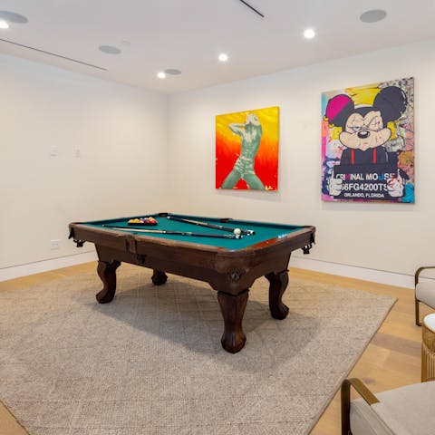 Show off your cue skills on the home's pool table