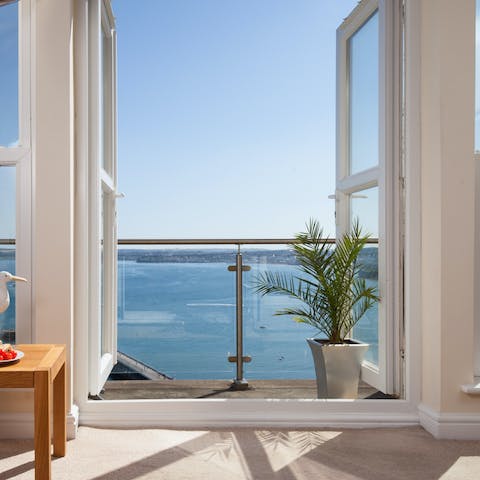 Wake up to the stunning seascape of the English Riviera from your living room
