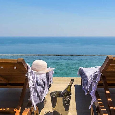Soak up the sun while admiring the breathtaking sea vistas from the terrace 